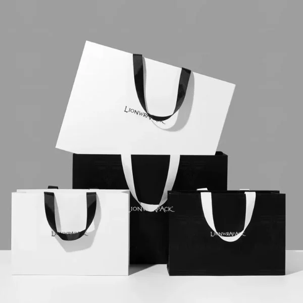 Gedruckte Luxus -Papiertüte Luxus Geschenkpapier Taschen OEM Logo Handtasche Einkaufstasche